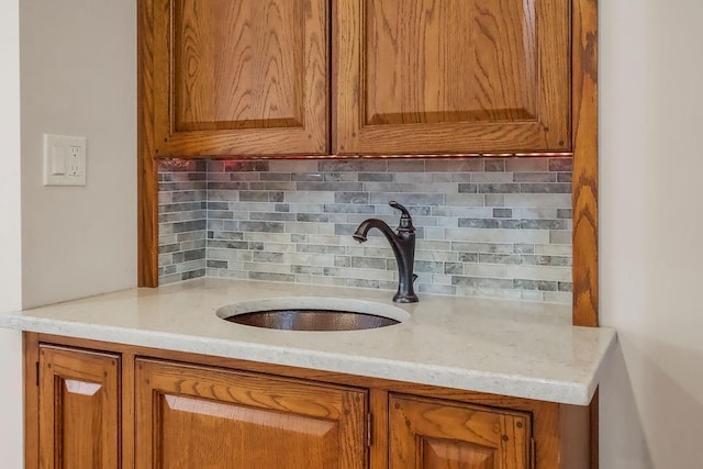 7718 W 100th St, Overland Park, KS 66212 - detailed view of a sink and tasteful backsplash