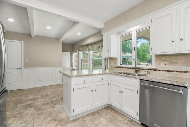 7718 W 100th St, Overland Park, KS 66212 - kitchen with dishwasher, beamed ceiling, a peninsula, light stone countertops, and white cabinets