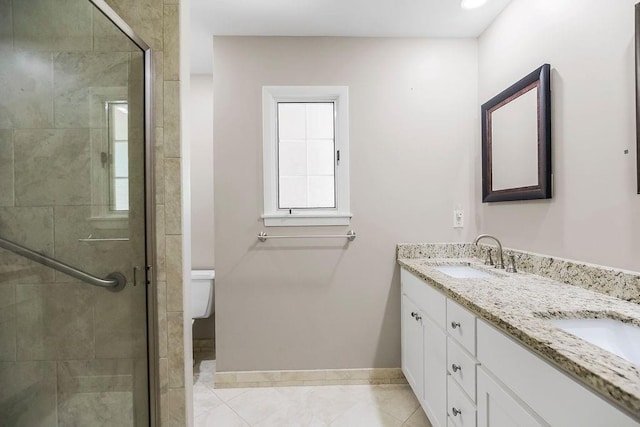 7718 W 100th St, Overland Park, KS 66212 - full bathroom with double vanity, a stall shower, and tile patterned floors