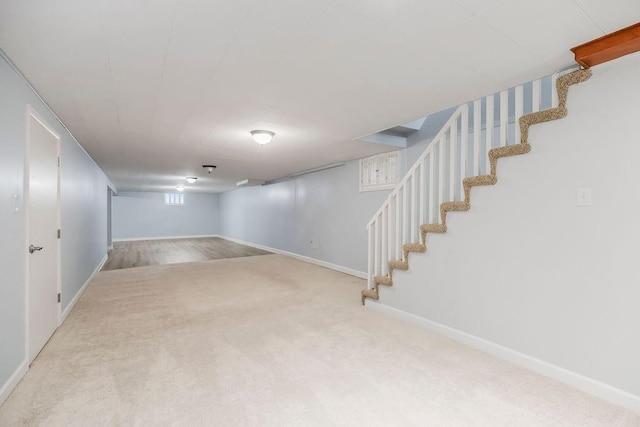 7718 W 100th St, Overland Park, KS 66212 - below grade area featuring stairs and carpet flooring