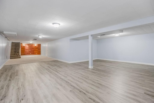 7718 W 100th St, Overland Park, KS 66212 - finished basement featuring stairs and wood finished floors