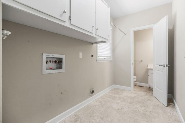 7718 W 100th St, Overland Park, KS 66212 - laundry room with cabinet space, hookup for an electric dryer, and washer hookup