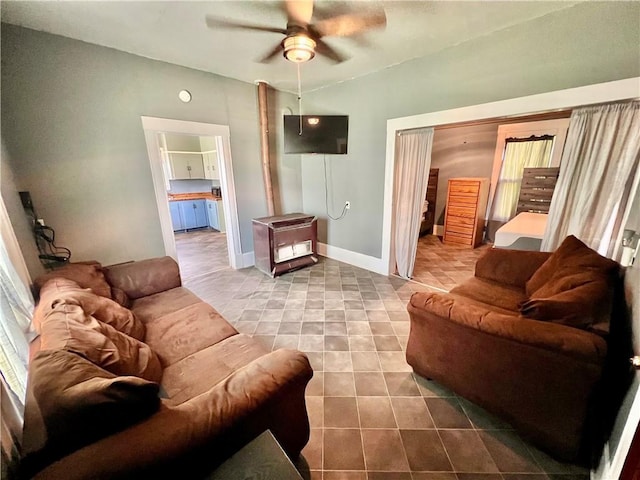 14364 N Bay St, Mercer, MO 64661 - living area featuring ceiling fan and tile patterned flooring