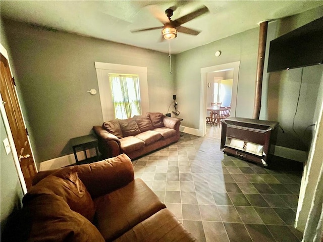 14364 N Bay St, Mercer, MO 64661 - tiled living area with ceiling fan and baseboards