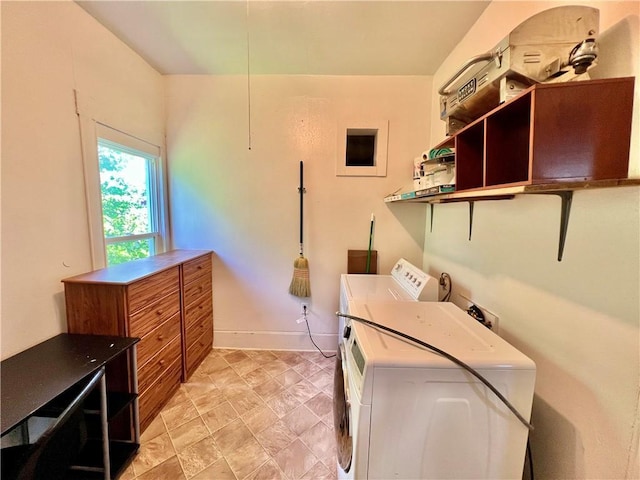 14364 N Bay St, Mercer, MO 64661 - washroom with washer and clothes dryer and baseboards