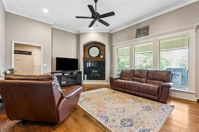 18501 S Butternut St W, Gardner, KS 66030 - living area with ornamental molding, ceiling fan, recessed lighting, wood finished floors, and a fireplace