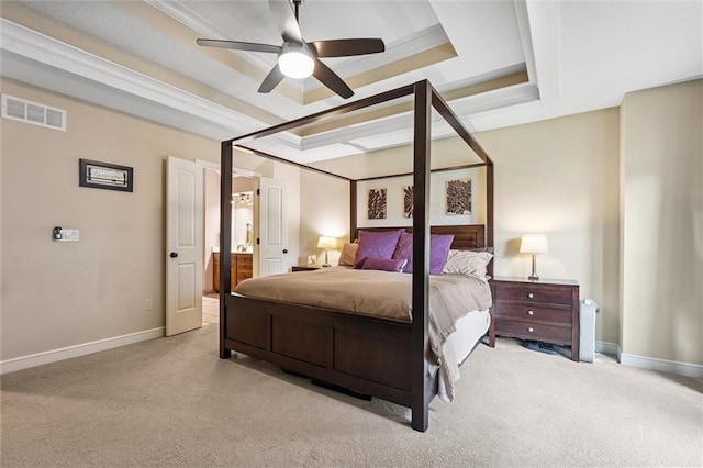 18501 S Butternut St W, Gardner, KS 66030 - bedroom featuring a tray ceiling, carpet flooring, ensuite bathroom, and a ceiling fan