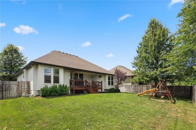 18501 S Butternut St W, Gardner, KS 66030 - rear view of house with a fenced backyard and a playground