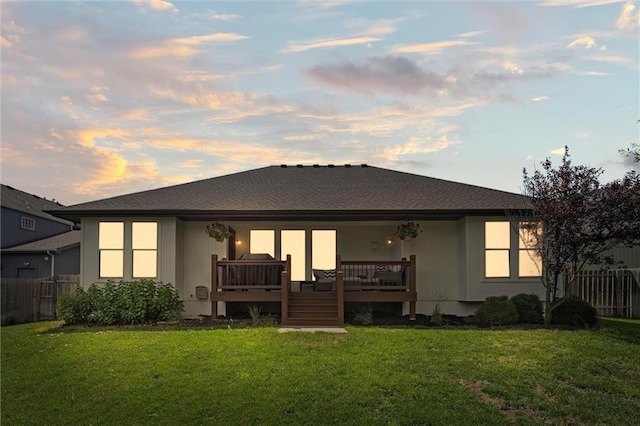 18501 S Butternut St W, Gardner, KS 66030 - back of house at dusk featuring a deck