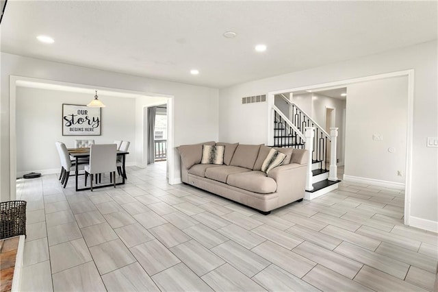 14733 Hickory Dr, Bonner Springs, KS 66012 - living room with stairs and recessed lighting