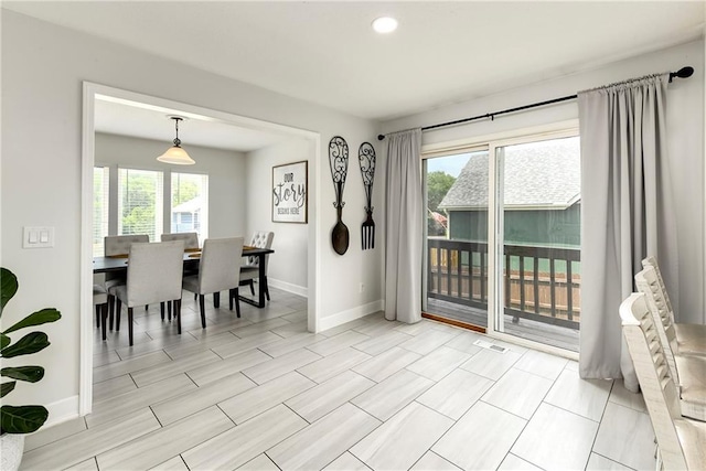 14733 Hickory Dr, Bonner Springs, KS 66012 - dining room with recessed lighting and wood finish floors