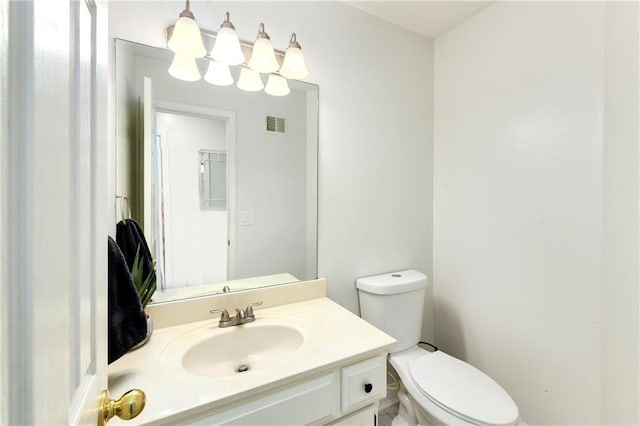 14733 Hickory Dr, Bonner Springs, KS 66012 - half bathroom featuring toilet and vanity
