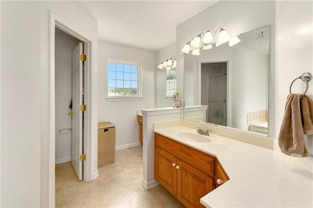 14733 Hickory Dr, Bonner Springs, KS 66012 - bathroom with vanity and baseboards