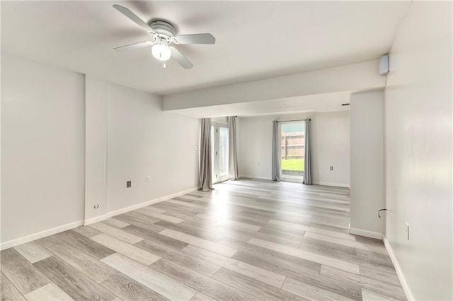 14733 Hickory Dr, Bonner Springs, KS 66012 - spare room featuring ceiling fan and light wood-type flooring