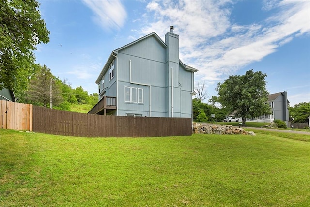 14733 Hickory Dr, Bonner Springs, KS 66012 - view of home's exterior with a chimney