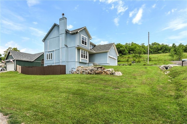 14733 Hickory Dr, Bonner Springs, KS 66012 - view of side of home with a chimney