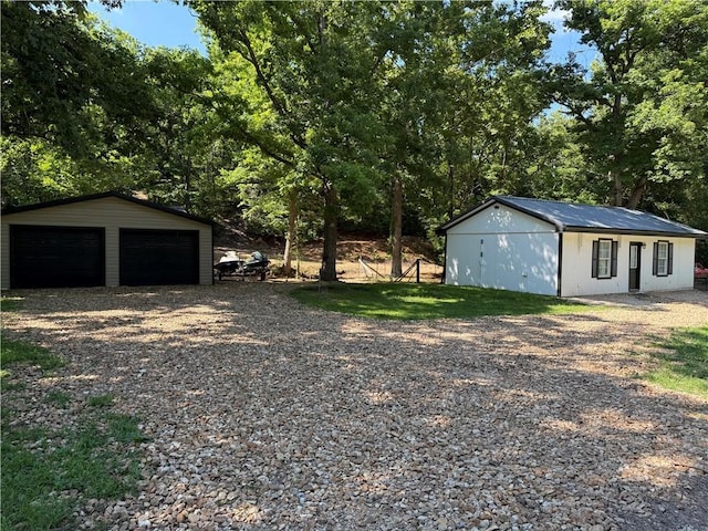 1807 Dodds Camp Rd, Climax Springs, MO 65324 - detached garage with view of scattered trees