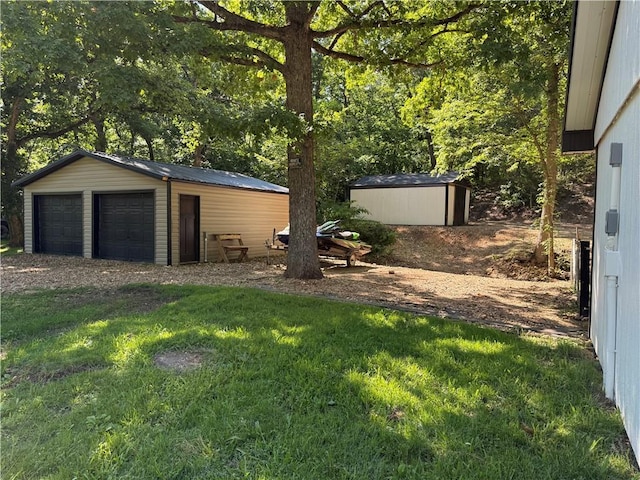 1807 Dodds Camp Rd, Climax Springs, MO 65324 - view of grassy yard with a garage and a shed