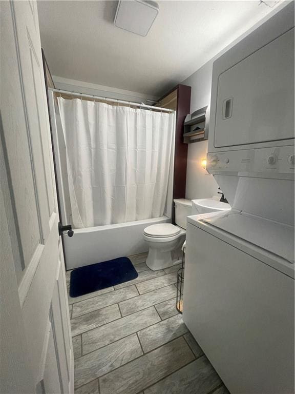 1807 Dodds Camp Rd, Climax Springs, MO 65324 - full bathroom with stacked washer / drying machine, shower / bath combo with shower curtain, and vanity
