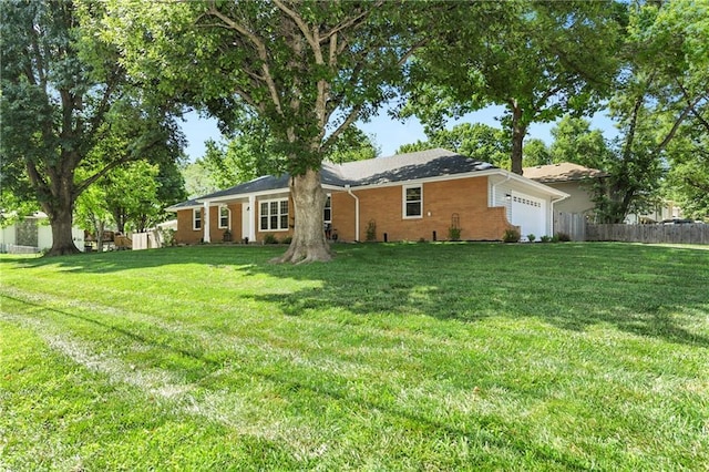 1410 Vilas St, Leavenworth, KS 66048 - view of yard featuring a garage