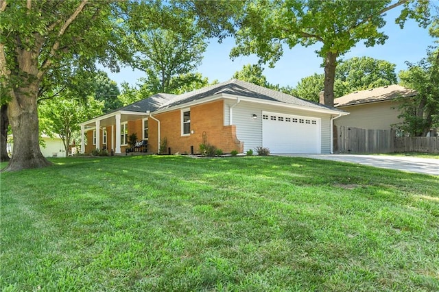 1410 Vilas St, Leavenworth, KS 66048 - single story home featuring a garage, driveway, a porch, and brick siding