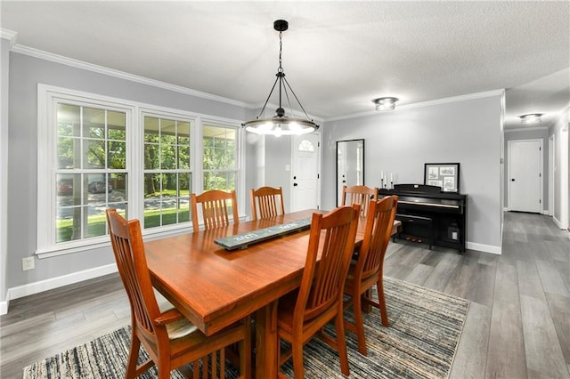 1410 Vilas St, Leavenworth, KS 66048 - dining room with wood finished floors and ornamental molding