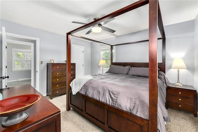 1410 Vilas St, Leavenworth, KS 66048 - bedroom with light carpet, multiple windows, and ceiling fan