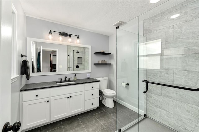1410 Vilas St, Leavenworth, KS 66048 - full bathroom featuring vanity, a shower stall, tile patterned flooring, and a textured ceiling