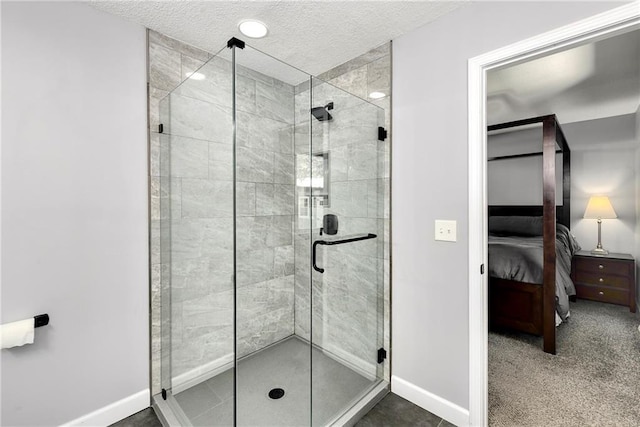 1410 Vilas St, Leavenworth, KS 66048 - ensuite bathroom featuring a stall shower and a textured ceiling
