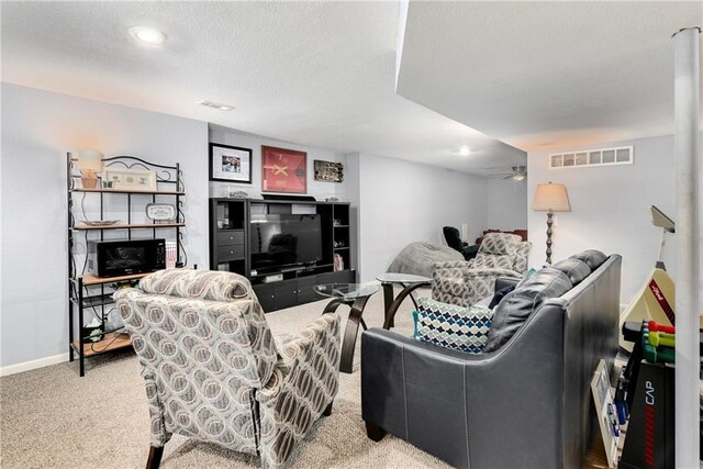 1410 Vilas St, Leavenworth, KS 66048 - carpeted living room featuring a ceiling fan and recessed lighting