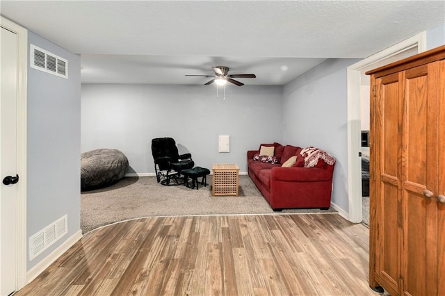 1410 Vilas St, Leavenworth, KS 66048 - living room with a ceiling fan and wood finished floors