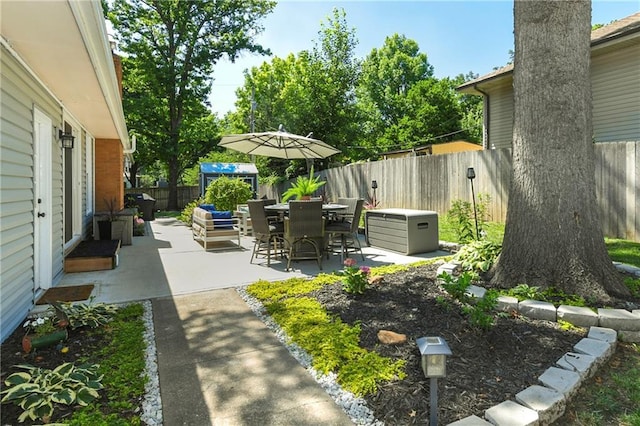 1410 Vilas St, Leavenworth, KS 66048 - fenced backyard featuring a patio area and outdoor dining space