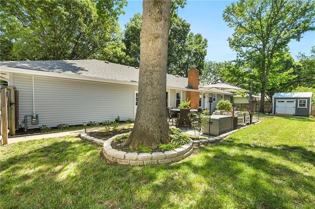 1410 Vilas St, Leavenworth, KS 66048 - back of house featuring a storage unit, outdoor lounge area, a patio area, a chimney, and roof with shingles