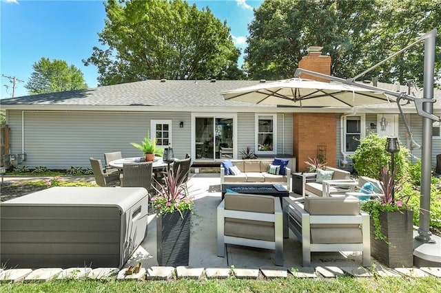 1410 Vilas St, Leavenworth, KS 66048 - back of house featuring an outdoor living space, a chimney, a patio area, a shingled roof, and outdoor dining area