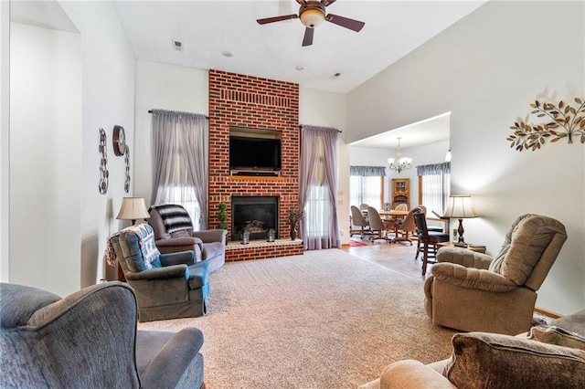 903 Howenstein St, Cameron, MO 64429 - carpeted living area featuring ceiling fan, a chandelier, and a fireplace