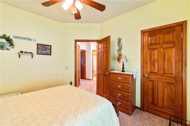 903 Howenstein St, Cameron, MO 64429 - bedroom with light carpet and a ceiling fan