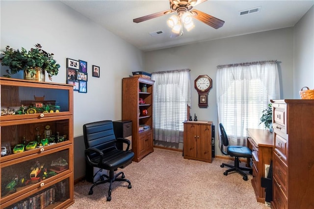 903 Howenstein St, Cameron, MO 64429 - office area with light carpet and a ceiling fan
