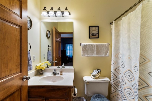 903 Howenstein St, Cameron, MO 64429 - bathroom with vanity and a shower with curtain