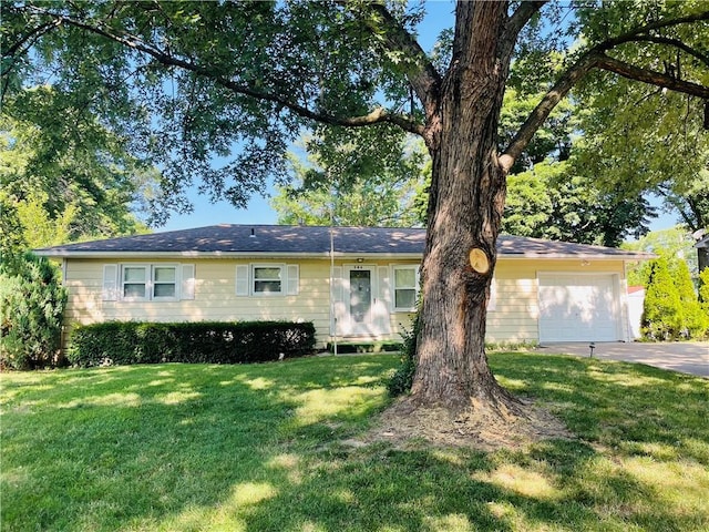 506 1st Ter, Lansing, KS 66043 - ranch-style home featuring driveway, a front lawn, and an attached garage
