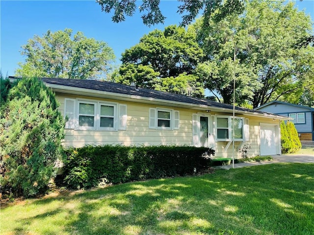 506 1st Ter, Lansing, KS 66043 - view of front facade featuring a front lawn