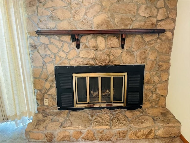 506 1st Ter, Lansing, KS 66043 - detailed view of a stone fireplace
