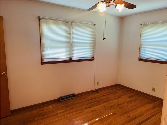 506 1st Ter, Lansing, KS 66043 - unfurnished room featuring a ceiling fan and wood finished floors