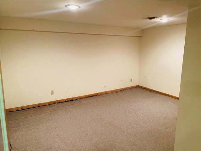 506 1st Ter, Lansing, KS 66043 - carpeted spare room with baseboards