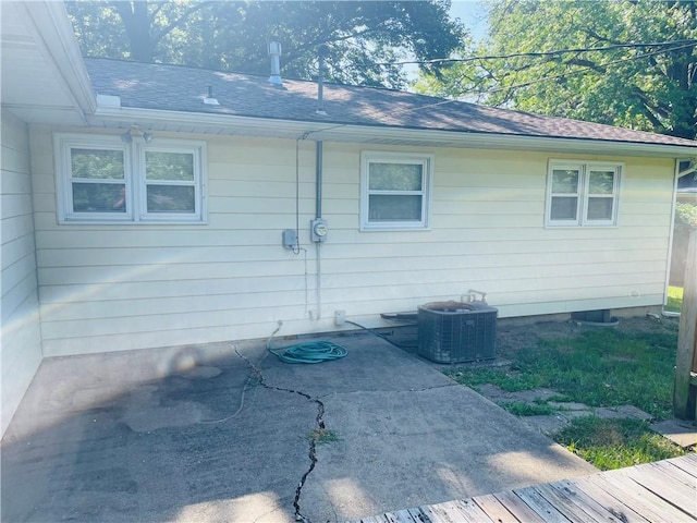 506 1st Ter, Lansing, KS 66043 - view of home's exterior featuring a shingled roof