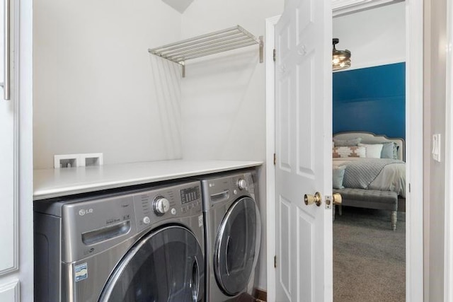 12312 Nieman Rd, Overland Park, KS 66213 - washroom with washer and clothes dryer and carpet floors