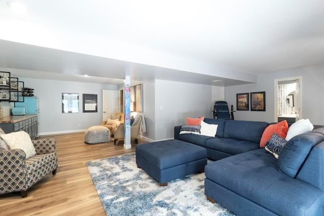 12312 Nieman Rd, Overland Park, KS 66213 - living area featuring light wood-type flooring and baseboards