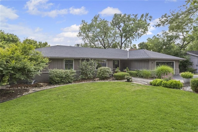 180 Terrace Trl S, Lake Quivira, KS 66217 - single story home with an attached garage, a front lawn, and a chimney