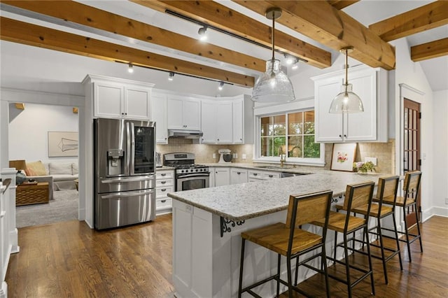 180 Terrace Trl S, Lake Quivira, KS 66217 - kitchen featuring stainless steel appliances, a peninsula, light stone counters, white cabinetry, and beam ceiling