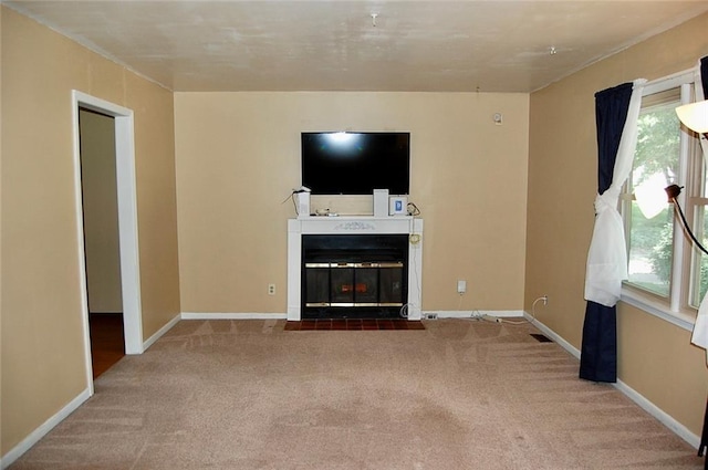 407 Hithergreen Dr, Lansing, KS 66043 - unfurnished living room with carpet, plenty of natural light, and a fireplace with flush hearth