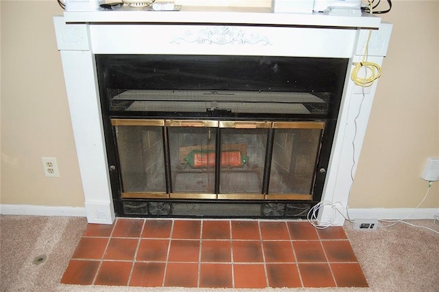 407 Hithergreen Dr, Lansing, KS 66043 - detailed view of baseboards and a fireplace